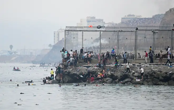 Andy Burnham is under pressure to beef up Britain's borders after 60,000 migrants crossed into the EU through the Spanish enclave of Ceuta in just one day.