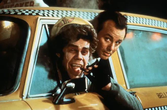 David Johansen as The Ghost Of Christmas Past with Bill Murray in Scrooged (1988).