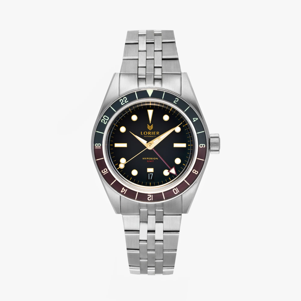 stainless steel wristwatch with black dial and multicolored bezel. stainless steel wristwatch with black dial and multicolored bezel.