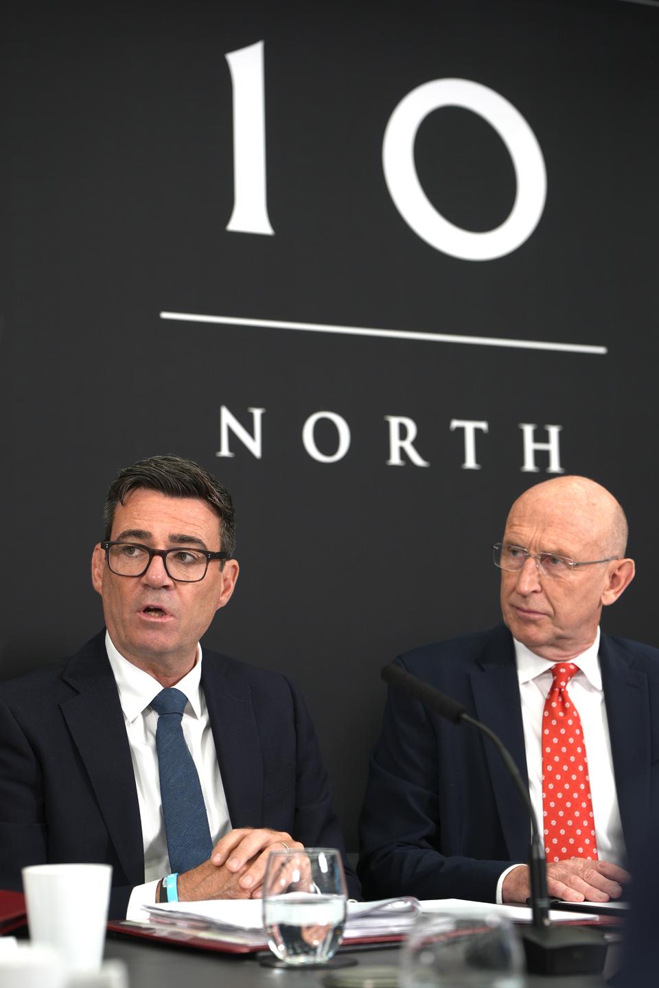 Prime Minister Andy Burnham (left) sits next to Chancellor of the Exchequer John Healey during a National Economic Council meeting at No 10 North, located in Heron House, central Manchester (Christopher Furlong/PA)