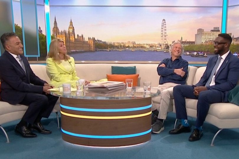 Good Morning Britain presenters with two guests on the sofa