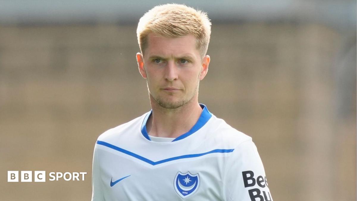 Josh Knight wearing Portsmouth's white away shirt during a pre-season friendly in July 2026