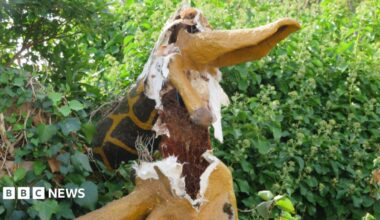 A picture of the destroyed giraffe, which appears to be made of a fibreglass-style material. It is yellow and brown in colour.