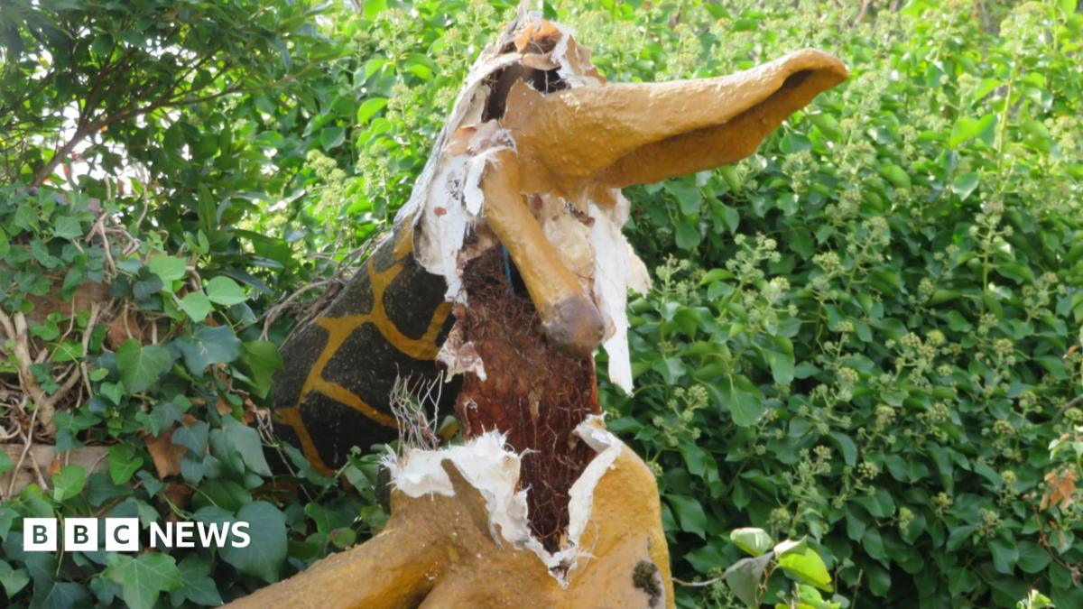 A picture of the destroyed giraffe, which appears to be made of a fibreglass-style material. It is yellow and brown in colour.