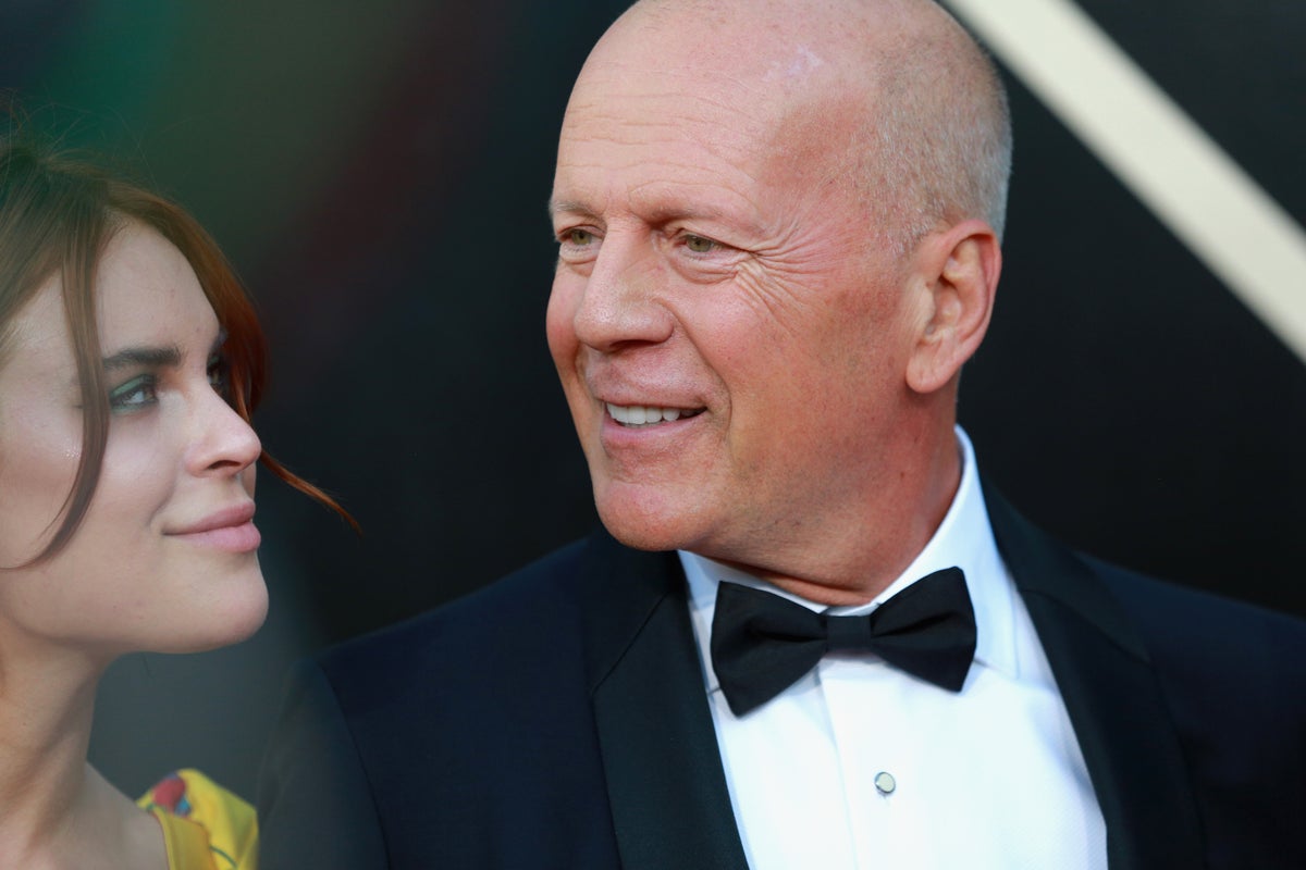 Bruce Willis embraces Tallulah in rare public appearance at wedding - The Independent