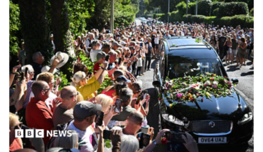 Flowers on a hearse