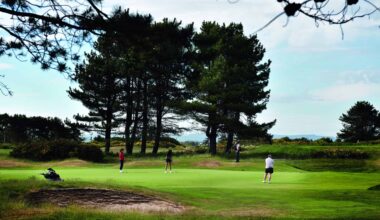 Bryson DeChambeau of the United States greets spectators during Day Three of the The 154th Open Championship at Royal Birkdale on July 18, 2026 in Southport, England. (Photo by Oisin Keniry/R&A/R&A via Getty Images)