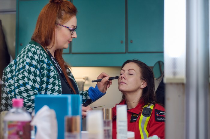 Elinor Lawless having makeup applied at Pinewood Studios