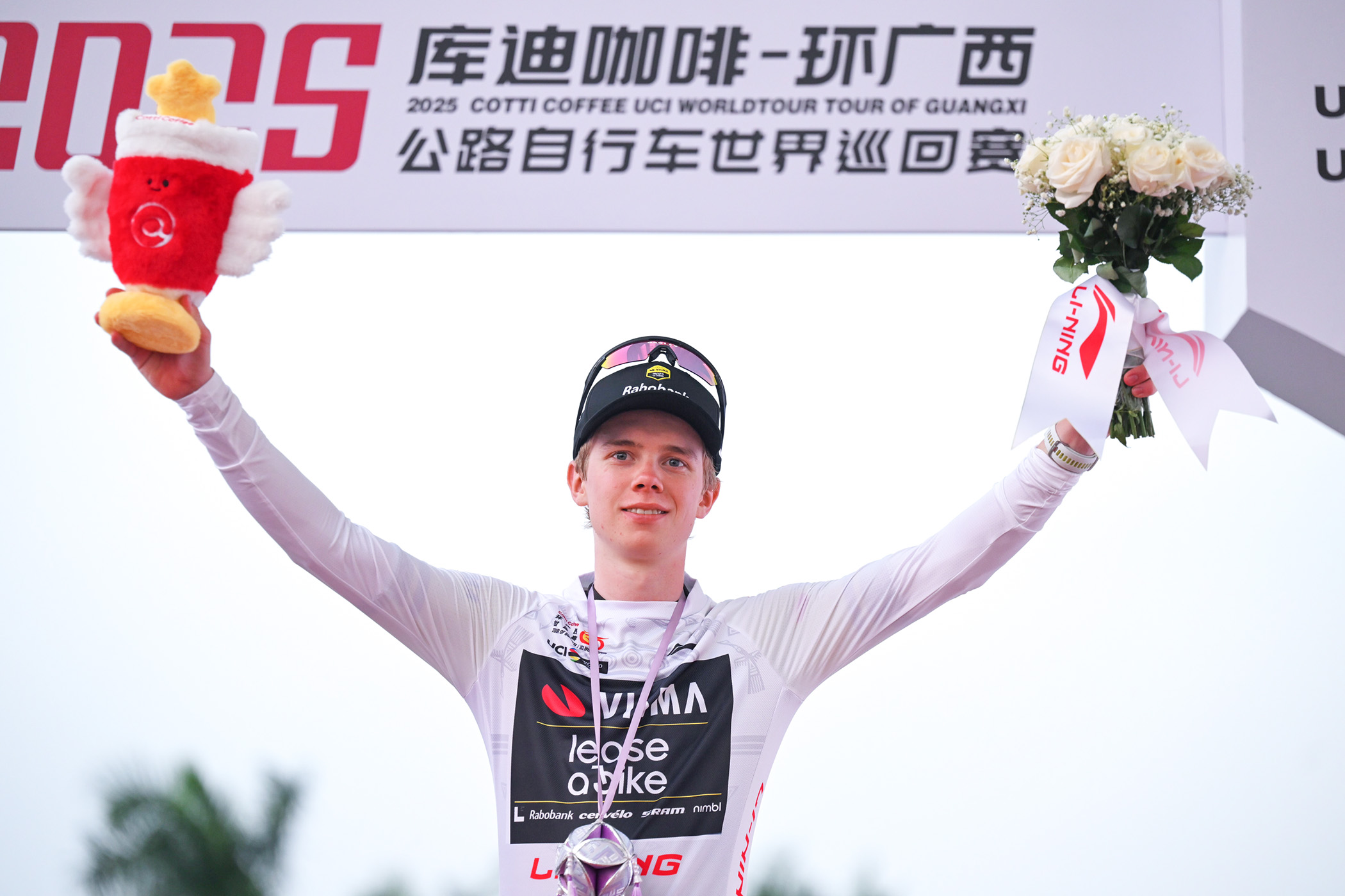 J&oslash;rgen Nordhagen celebrates as best young rider on the final podium of the 2025 Tour of Guangxi