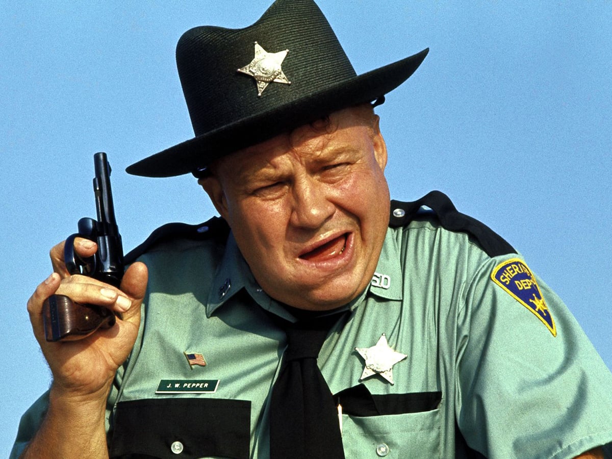 Clifton James as Sheriff J.W. Pepper, ‘The Man With The Golden Gun’