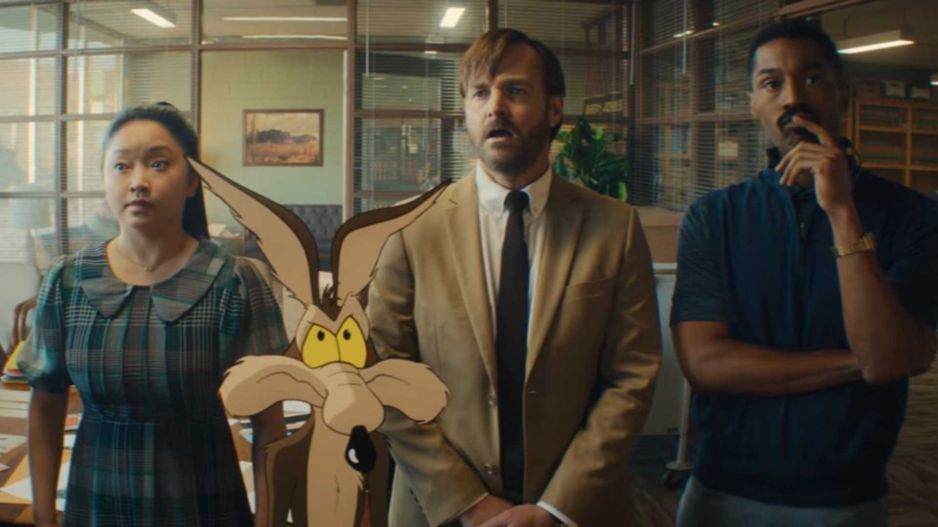 A shot in the Coyote vs. ACME trailer showing Will Forte as Kevin Avery, Lana Condor as Paige Avery, and Tone Bell as Sal Maltese.