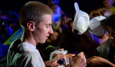 Tour de France's five-time winner Slovenian rider Tadej Pogacar signs autograph as part of a ceremony dedicated to this year's victory during the Pogi Challenge eventT
