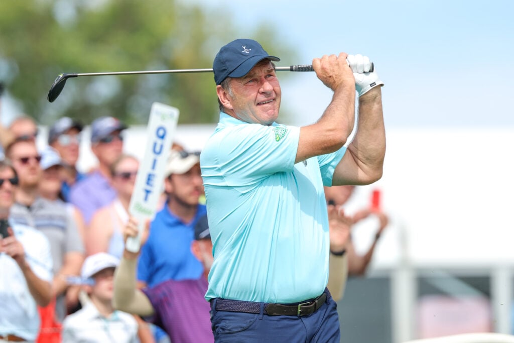 Former Professional Golfer Sir Nick Faldo hits a shot on the tenth tee during the EMC Greats of the Game exhibition event during the second round of the Sanford International 2025