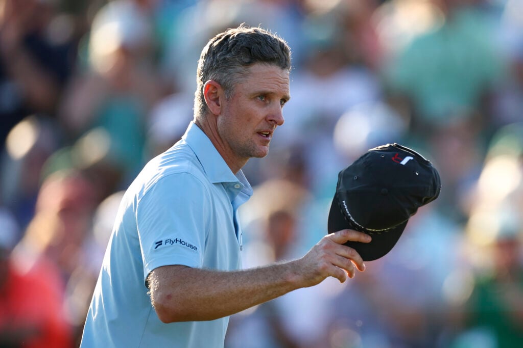 Justin Rose of England acknowledges the crowd on the 18th green during the third round of the 2026 Masters Tournament