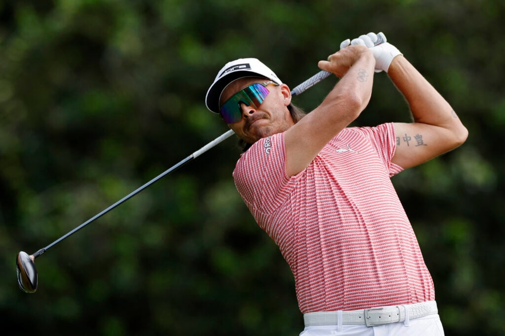 Rickie Fowler hits a tee shot during the second round of the Truist Championship