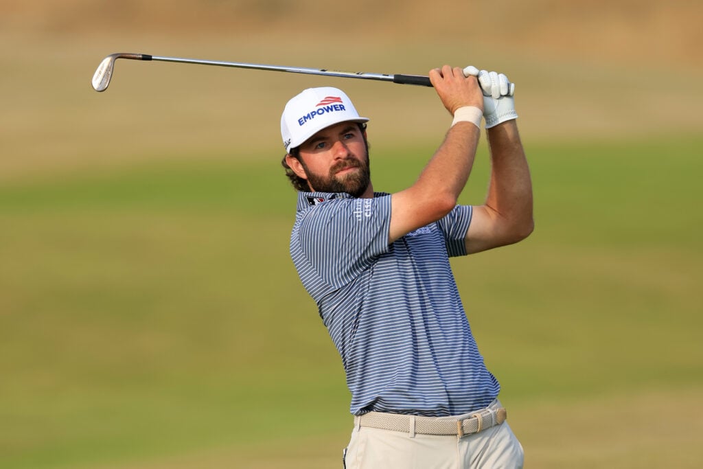 Cameron Young of the United States hits his second shot on the 14th hole on Day One of the The 154th Open Championship at Royal Birkdale