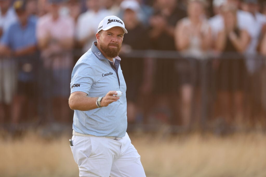 Shane Lowry of Ireland acknowledges the crowd on the 18th green on day one of the The 154th Open Championship at Royal Birkdale