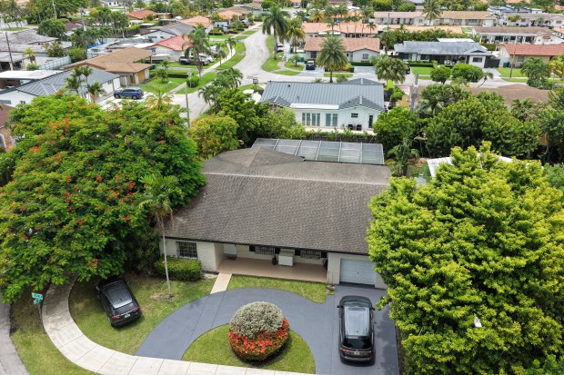 In an aerial view, the home where Perez Hilton was found after he appeared to harm himself during a TikTok livestream on Aug. 5, 2026, in Westchester, Florida. (Photo by Joe Raedle/Getty Images)
