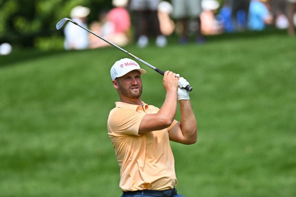 Wyndham Clark of the United States watches his second shot from the 5th fairway during the first round of the PGA BMW Championship