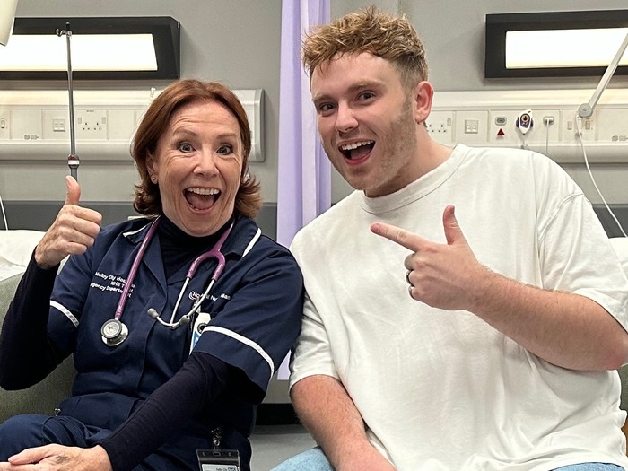 Melanie Hill and Radio Times soaps editor Michael Adams on set at Casualty
