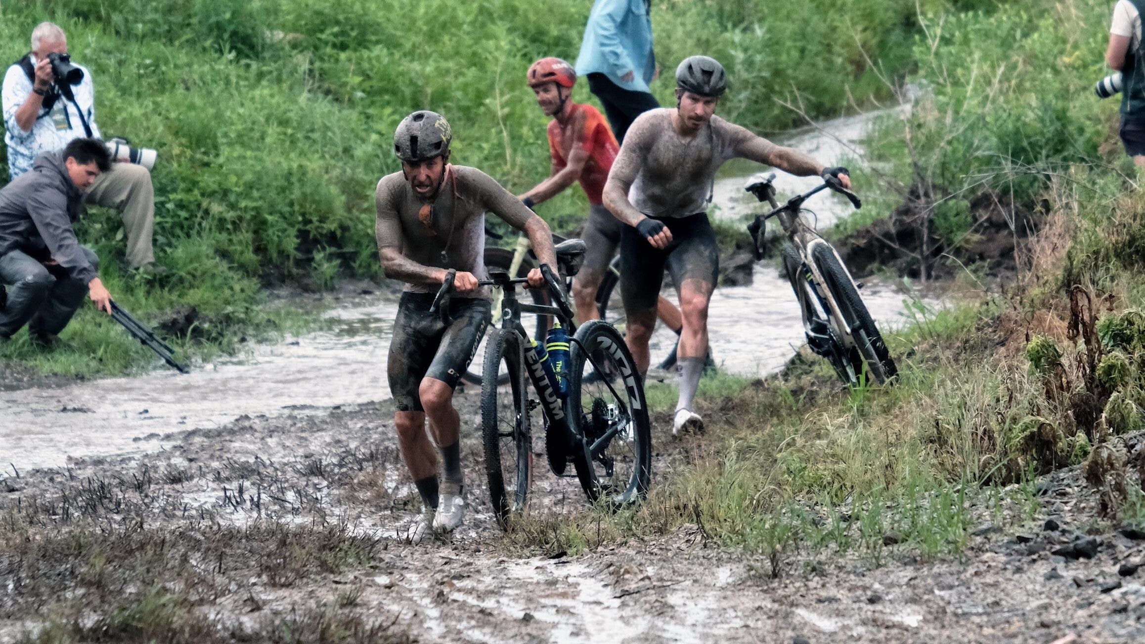 Mike Woods experiencing the infamous mud of Unbound Gravel