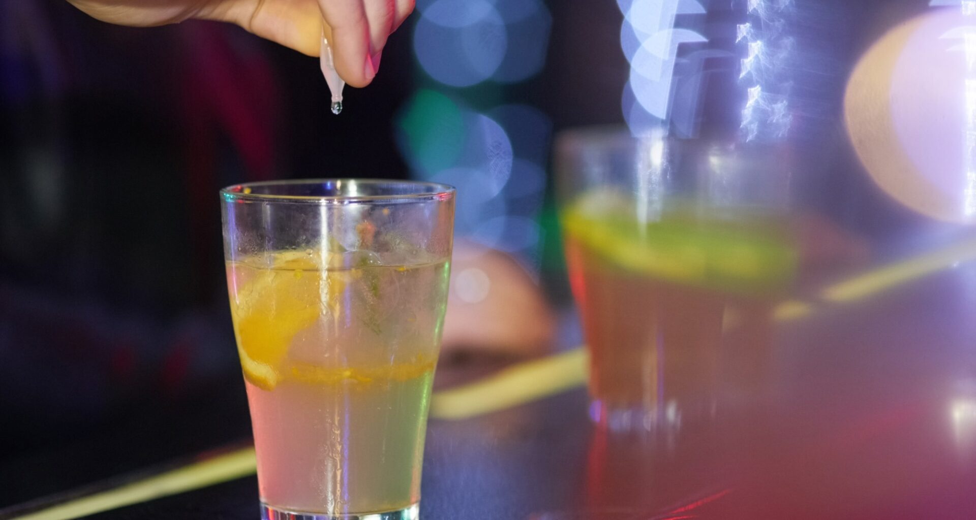 Understanding drink spiking and needling experiences and reporting in the UK. Image Credit: PeopleImages / Shutterstock