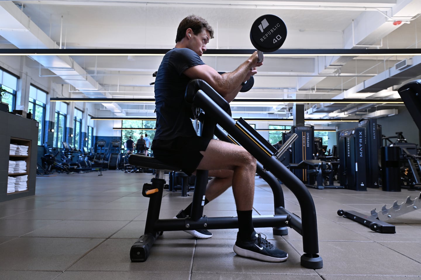 Jason Fitch, of Cambridge, worked out at Republic Fitness in Davis Square this summer.