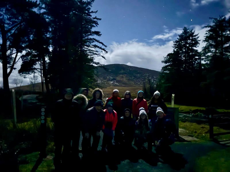 A group get ready for a dark sky park walk