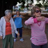 Maribel Ezcurra, 77, a retired milling machine mechanic, practices tai chi with fellow seniors in a park in the Playa neighborhood of Havana, Cuba, Wednesday, April 15, 2026. (AP Photo/Ramon Espinosa)