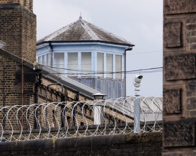 LONDON, ENGLAND - JULY 12: Security cameras at HMP Wandsworth prison on July 12, 2024 in London, England. The country's new justice secretary, Shabana Mahmood, announced today that the government will release thousands of prisoners early to alleviate overcrowding. Under the new policy, prisoners on "standard determinate sentences" will be released after serving 40% of their sentences, rather than 50%. (Photo by Dan Kitwood/Getty Images)