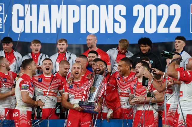MANCHESTER, ENGLAND - SEPTEMBER 24: James Roby of St Helens celebrates with the Betfred Super League Grand Final trophy as players of St Helens celebrate after their side's victory during the Betfred Super League Grand Final match between St Helens and Leeds Rhinos at Old Trafford on September 24, 2022 in Manchester, England. (Photo by Gareth Copley/Getty Images)