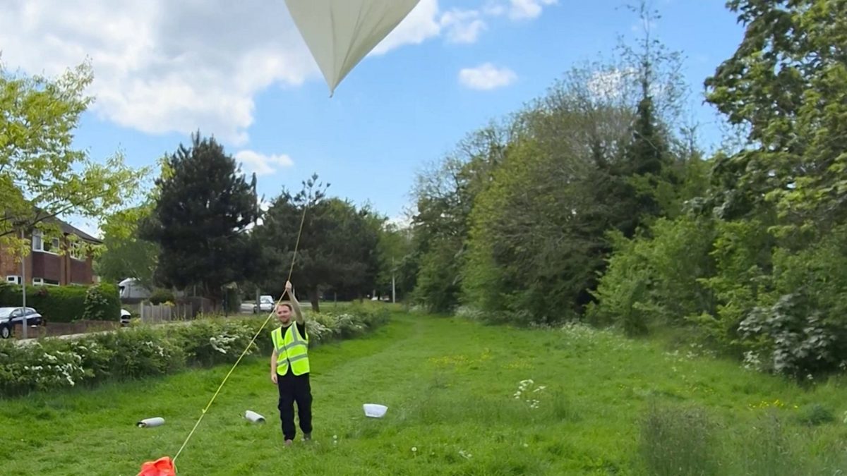 The balloon taking off and rising into space. // A dog's ashes were launched 119,000ft and scattered in space. Oscar, a six-year-old French bulldog who died suddenly from a brain tumour earlier this year, has been given one final adventure after his ashes were sent to the edge of the atmosphere in a weather balloon. His favourite Toy Story alien plush and a pet GPS tracker travelled to the edge of Earth's atmosphere in a weather balloon tribute on May 7, 2026. His owner, Jacob Battersby, 26, from Stockport, and friend Callum King, 26, from Rugby, launched the balloon from Rugby, Warwickshire.