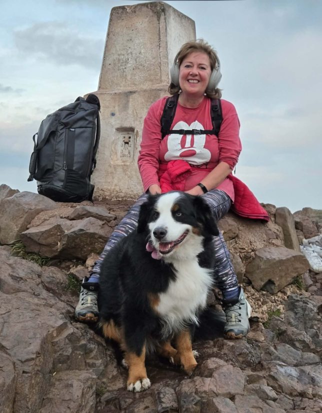 Susan with her dog at Arthur's Seat in Edinburgh