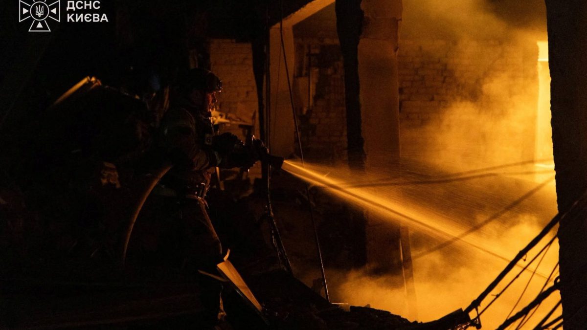A firefighter works at a compound of a warehouse hit by an overnight missile strike, amid Russia's attack on Ukraine, in Kyiv, Ukraine August 11, 2026. Press service of the State Emergency Service of Ukraine in Kyiv city/Handout via REUTERS ATTENTION EDITORS - THIS IMAGE HAS BEEN SUPPLIED BY A THIRD PARTY. DO NOT OBSCURE LOGO.