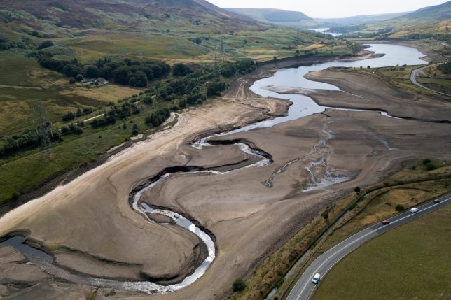 Woodhead reservoir near Manchester, England, Thursday, Aug. 13, 2026, as more than two-thirds of the UK suffers under drought conditions. (AP Photo/Jon Super)