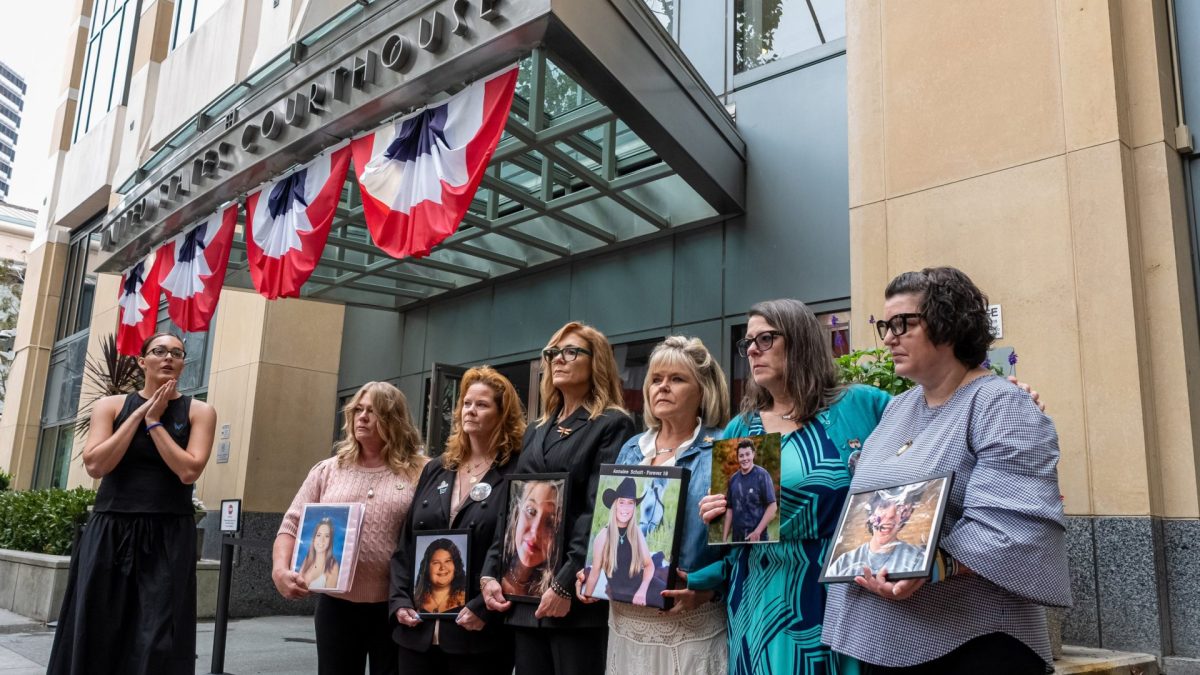 Mothers of children who allegedly died due to impacts of social media during a protest outside the Ronald V. Dellums Federal Building & US Courthouse in Oakland, California, US, on Tuesday, Aug. 18, 2026. Meta Platforms Inc. is headed to court Tuesday for a high-stakes showdown with a coalition of state attorneys general over claims that the company deliberately designed Facebook and Instagram to encourage compulsive use among young users. Photographer: David Paul Morris/Bloomberg via Getty Images