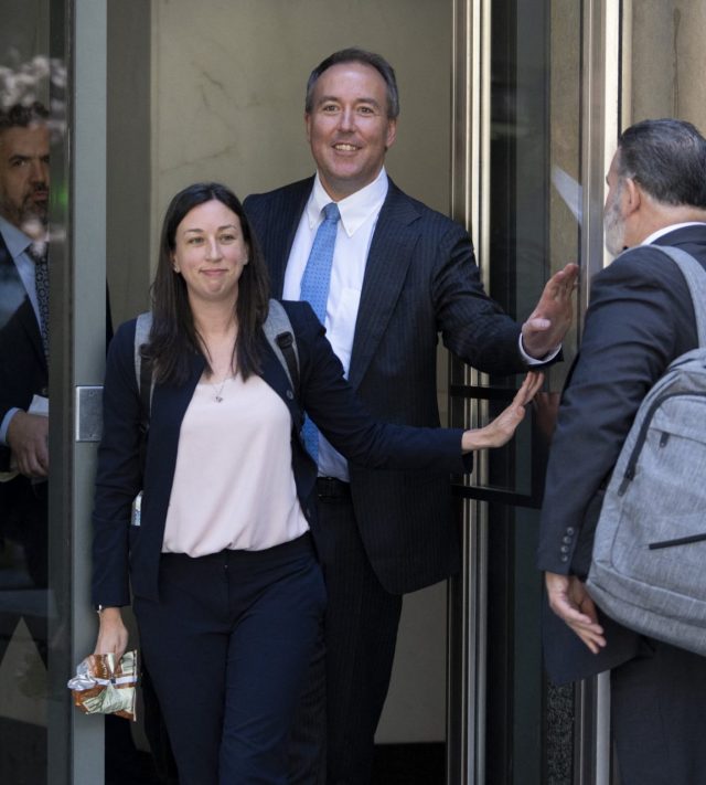 Colorado Chief Trial Counsel Jason Slothouber (C) and California Deputy Attorney General Megan O'Neill (C-L) exit Ronald V. Dellums Federal Building & United States Courthouse in Oakland, California, on August 12, 2026 during jury selection as Meta faces trial about alleged harms to children. The federal trial, one of the most consequential among a myriad of legal proceedings targeting social networks in the United States, will begin Wednesday with jury selection at a federal court in Oakland, near San Francisco. (Photo by Godofredo A. V??SQUEZ / AFP via Getty Images)