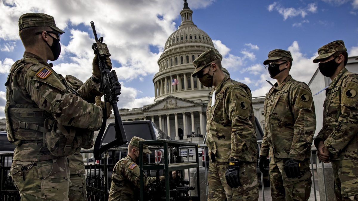 WASHINGTON, DC - JANUARY 17: Virginia National Guard soldiers are issued their M4 rifles and live ammunition on the east front of the U.S. Capitol on January 17, 2021 in Washington, DC. After last week's riots at the U.S. Capitol Building, the FBI has warned of additional threats in the nation's capital and in all 50 states. According to reports, as many as 25,000 National Guard soldiers will be guarding the city as preparations are made for the inauguration of Joe Biden as the 46th U.S. President. (Photo by Samuel Corum/Getty Images)