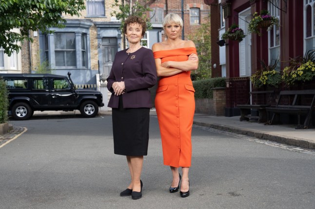 Nicola Mitchell and mum Rose Hawkins outside the Queen Vic pub in an EastEnders promo.