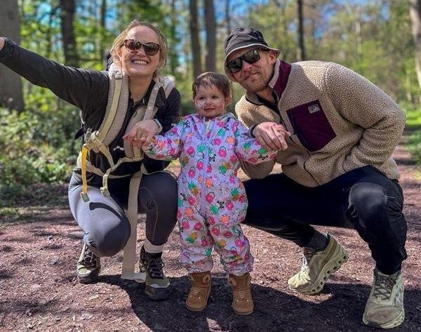 Anna Chattaway and Dom Wilde, with their daughter Florence. // A toddler whose belly ballooned was diagnosed with a 2kg tumour after doctors repeatedly told her parents she was constipated. Florence Wilde, two, was diagnosed with neuroblastoma - a rare cancer of the cell - in November 2024. Her parents Anna Chattaway and Dom Wilde, both 32, first noticed something was wrong when Florence became repeatedly rundown. The toddler's tummy began to swell so the pair rushed her to Three Villages GP in Stourbridge but doctors ruled out the symptoms as constipation, prescribing the tot laxatives. Photo released 21/08/2026