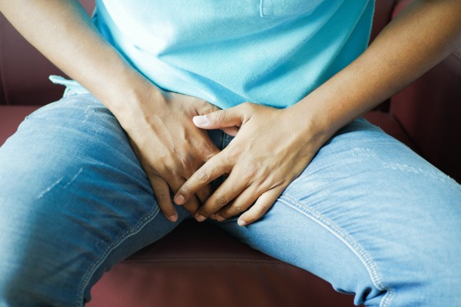 the concept of prostate and bladder problem, crotch pain of a young person .