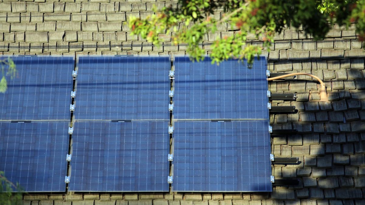 Solar panels on the roof of a home. The plug connecting the panels and the house can be seen on the right. March 2015 Long Beach, California