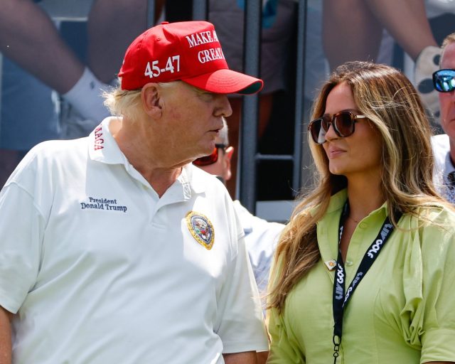 BEDMINSTER, NJ - AUGUST 11: Former President Donald Trump and Margo Martin his deputy director of communications at the 1st tee during LIV Golf Bedminster- round 1 on August 11, 2023 at Trump National Golf Club in Bedminster, New Jersey. (Photo by Rich Graessle/Icon Sportswire via Getty Images)