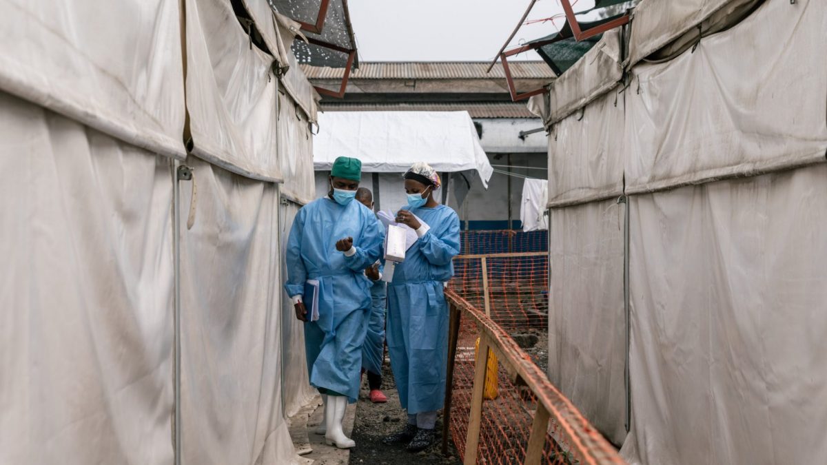 Health workers during a patient room tour at the Munigi mpox treatment center in Nyiragongo territory, North Kivu, Democratic Republic of Congo, on Tuesday, Aug. 20, 2024. As disease detectives rush to central Africa to quell a??mushrooming mpox??contagion, they're finding a complex mosaic of infection patterns involving different viral strains and vastly different routes of infection. Photographer: Arlette Bashizi/Bloomberg via Getty Images