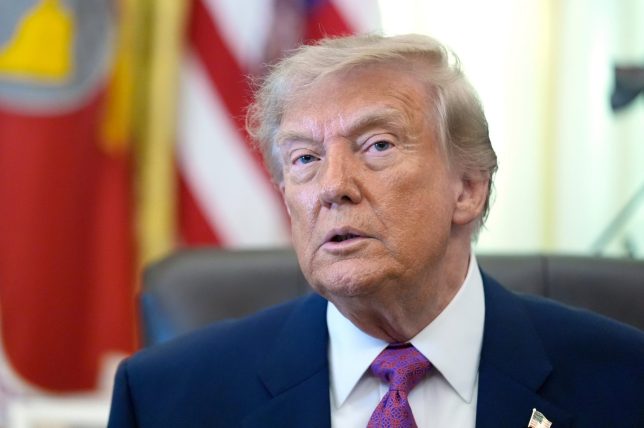 President Donald Trump listens as a reporter asks a question in the Oval Office of the White House, Thursday, Aug. 27, 2026, in Washington. (AP Photo/Manuel Balce Ceneta)