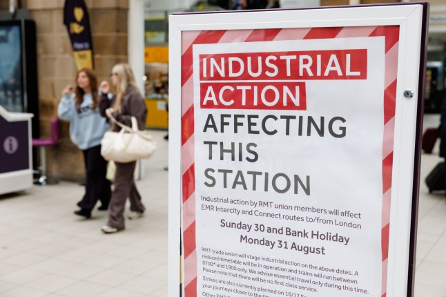 A notice at Sheffield railway station in the United Kingdom on August 27, 2026, informs passengers of upcoming industrial action by the RMT union over the bank holiday weekend. The action will affect East Midlands Railway Intercity and Connect services on August 30 and August 31.