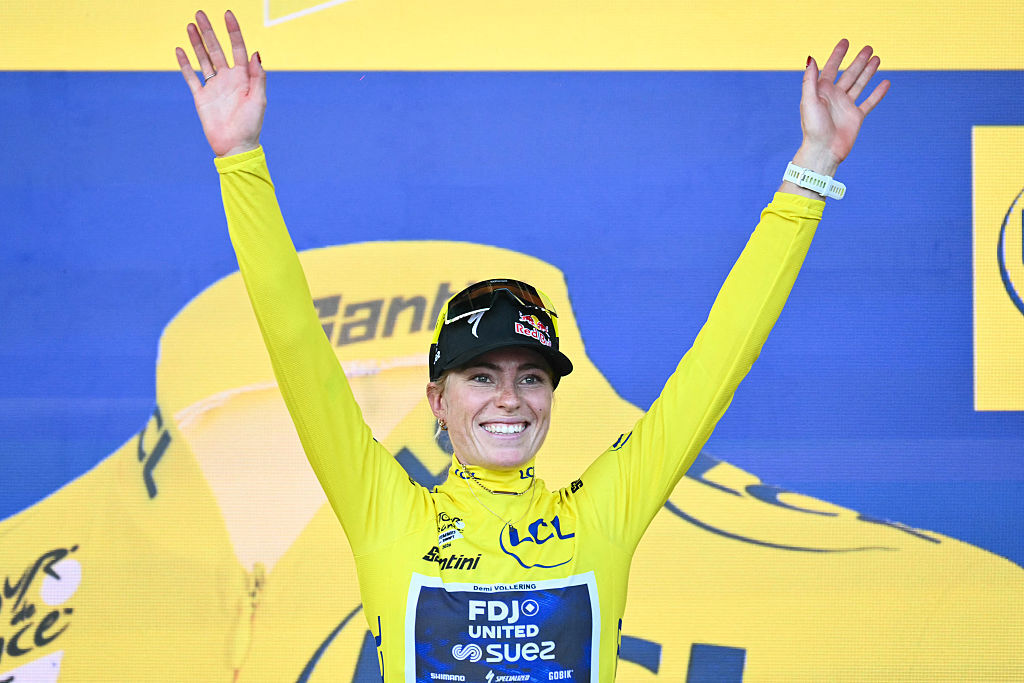 Demi Vollering celebrates on the podium with the overall leader&rsquo;s yellow jersey after winning the 9th and final stage and the fifth edition of the Women&rsquo;s Tour de France cycling race, 99.2 km from Nice to Nice, southeastern France on August 9, 2026. (Photo by NICOLAS TUCAT / AFP via Getty Images)