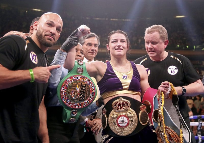 Katie Taylor celebrates her win against Delfine Persoon in the IBF, WBC, WBO, WBA, Ring Magazine Women's Lightweight World Championships fight at Madison Square Garden, New York.. 