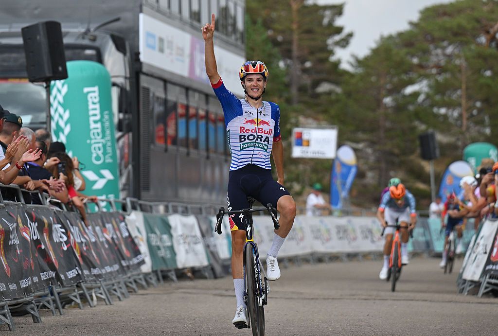 Giulio Pellizzari celebrates the stage win