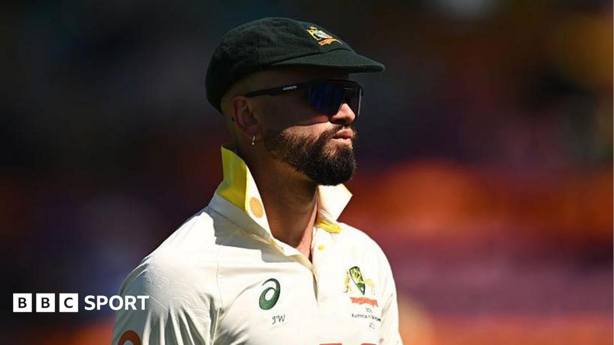 Australia's Jake Weatherald in the field during a Test match. He is wearing his baggy green cap, sunglasses and has the collars of his white shirt turned up.
